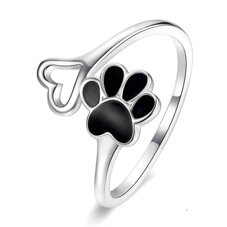 Open paw print sterling silver ring with black enamel details