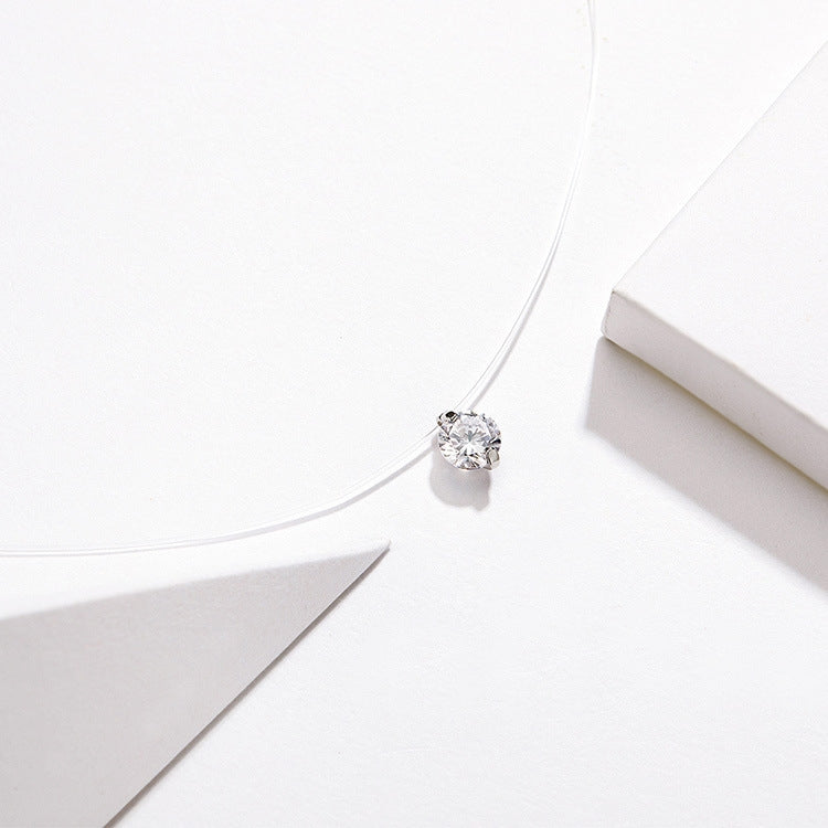 Sterling silver fish line necklace with small round zircon pendant
