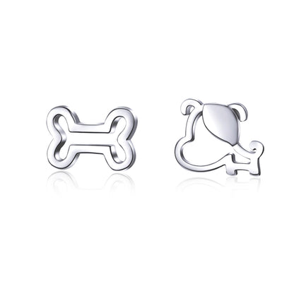 Hollow dog bone stud earrings in polished sterling silver, pair view