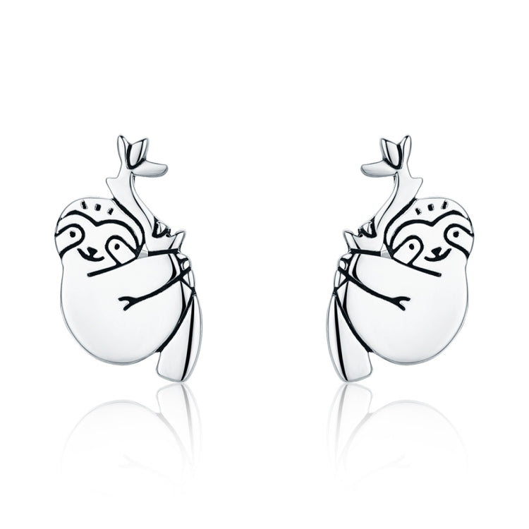 Silver sloth stud earrings, oval face with dotted details and small leaf top