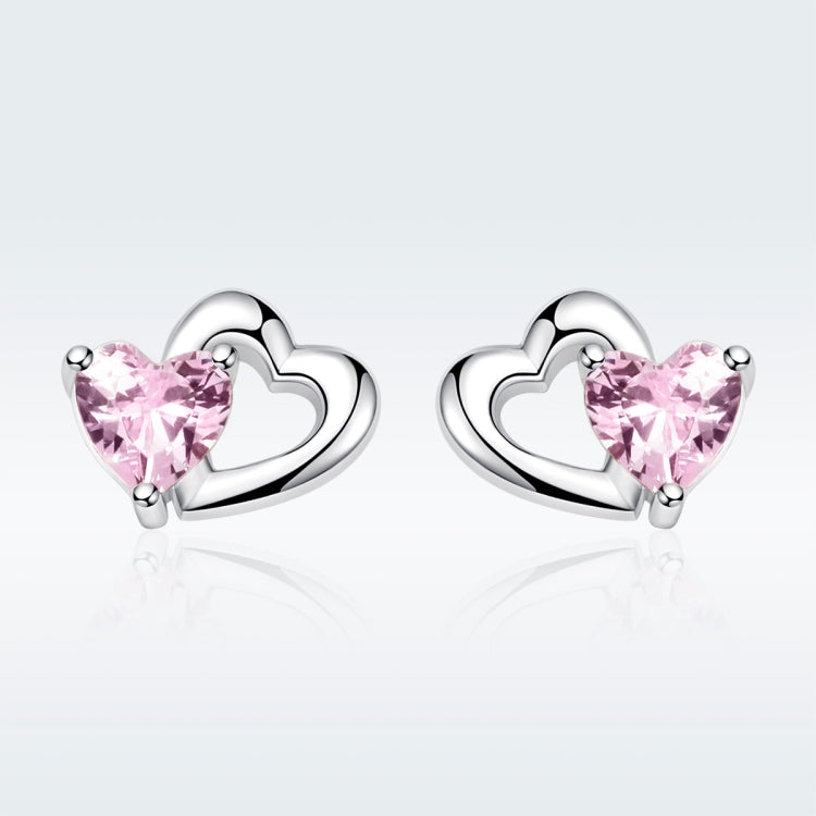 Heart stud earrings in sterling silver with pink gemstone hearts