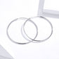 Large oval hoop earrings in silver-tone, two hoops overlapped