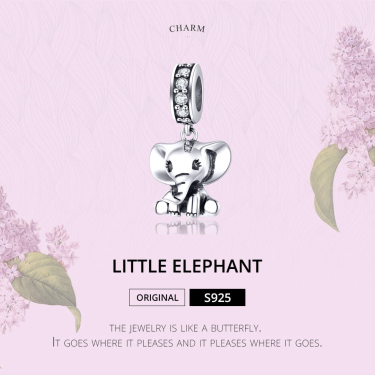 Sterling silver elephant charm pendant with shiny oxidized texture and CZ ring