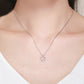 Sterling silver cat-and-heart pendant necklace on model, resting at collarbone