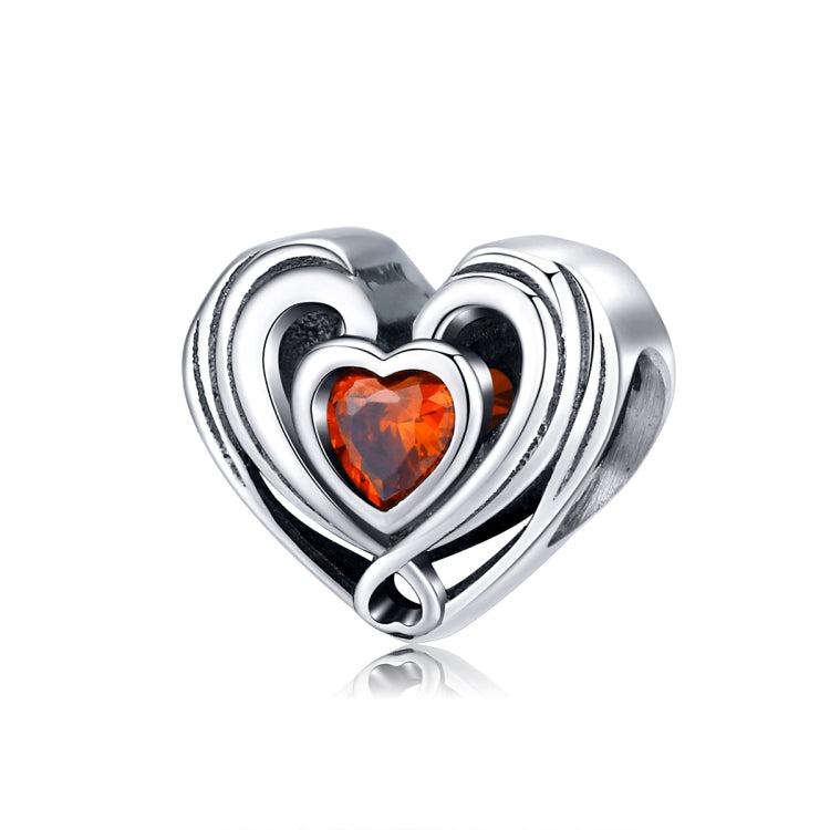 Heart-shaped sterling silver charm bead with orange heart CZ and double-heart frame