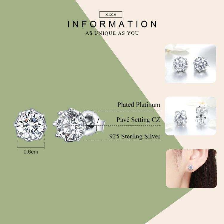 Sterling silver CZ stud earrings with round clear stones, shown from front and side