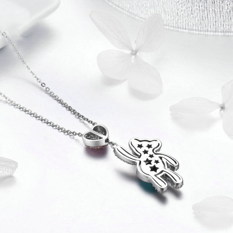 Sterling silver bear-shaped charm pendant with star accents on a chain