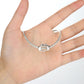 S925 sterling silver bead with heart-and-hands motif on bracelet, worn on open palm