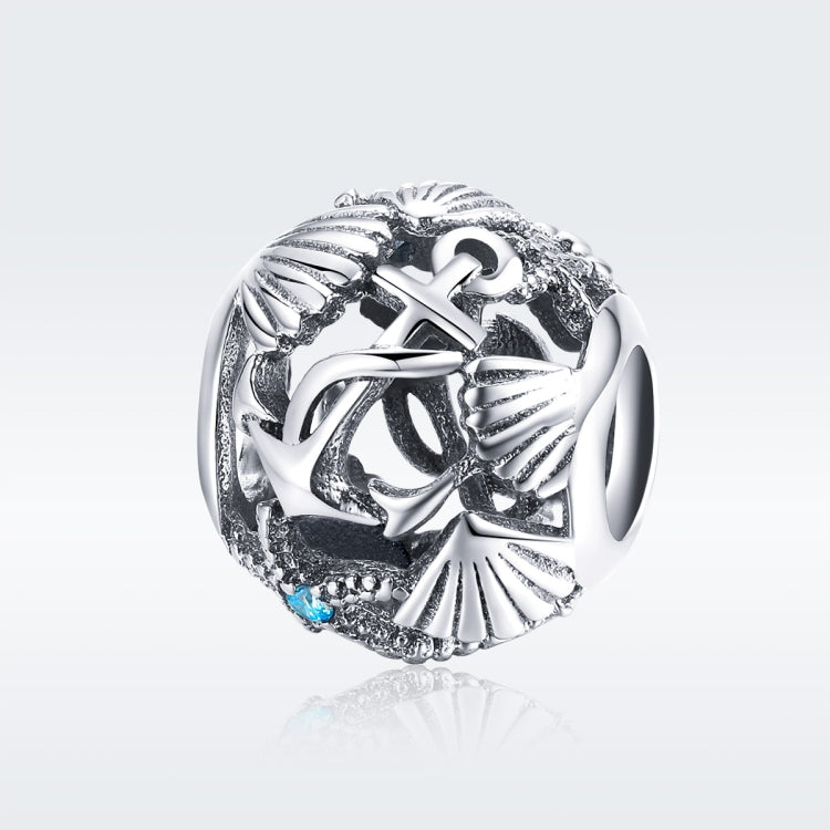 Sterling silver beach charm bead with anchor motif and blue CZ inlay