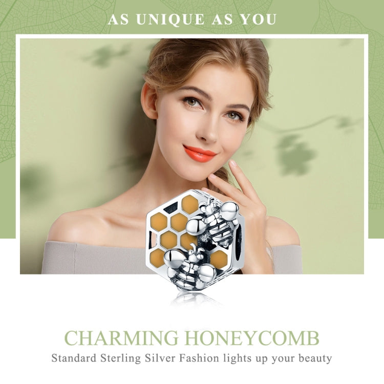 Bee hive charm bead on bracelet, with yellow honeycomb enamel and bee figure details