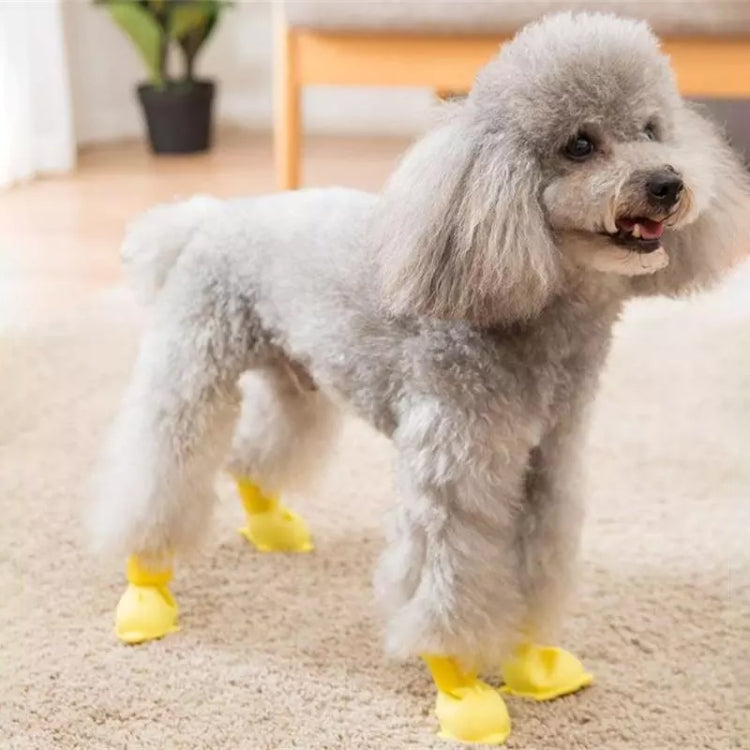 Cartoon dog waterproof rain boots set, yellow paw boots on standing dog