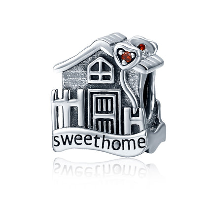 Sterling silver house charm bead with red heart accents and sweet home engraving