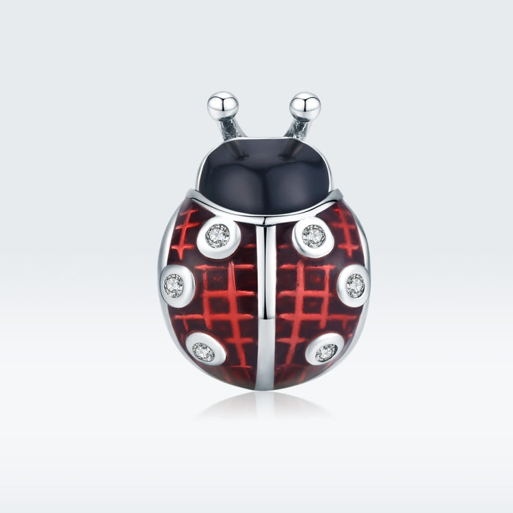 Front-facing oxidized silver ladybug pendant charm with red enamel and CZ accents