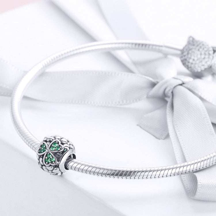 S925 sterling silver clover charm bead with green stones on braided bracelet cord