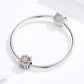 Sterling silver charm bracelet with four-leaf clover bead and pavé clasp