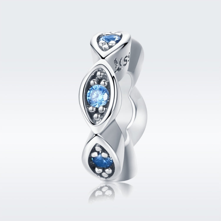 Oxidized silver double-eye charm bead with two blue crystal accents