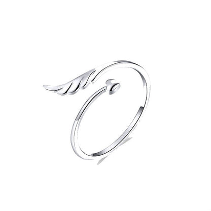 Silver open ring with angel wings motif, white gold plated look