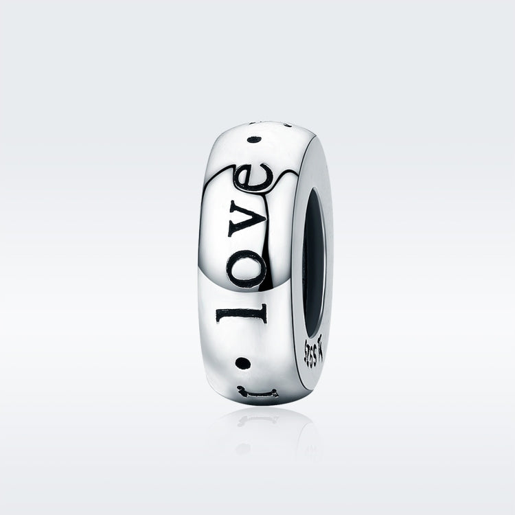 Sterling silver heart bead with “love you” lettering, side view