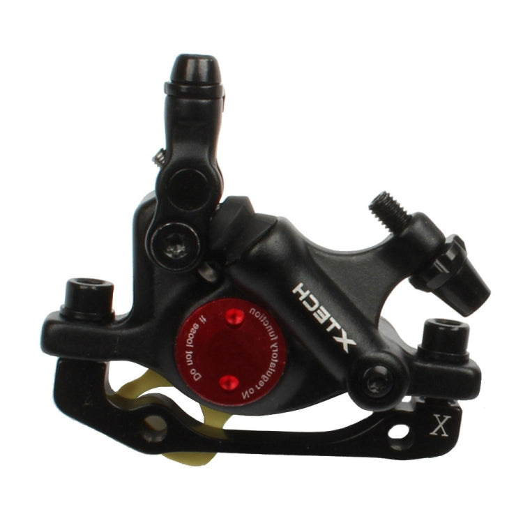 Black hydraulic disc brake caliper with red regulator dial and mounting hardware