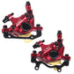 Pair of red hydraulic disc brake calipers with mounting brackets and hose ports