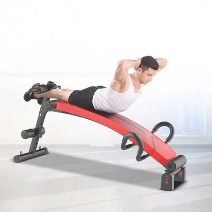 Red foldable sit-up board with padded rollers, leg handles, and support frame