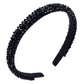 Black crystal beaded fabric headband with black fabric tips and a curved band
