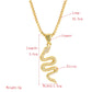 Gold snake pendant necklace with zircon-studded outline and link chain bail