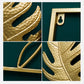 Gold metal leaf wall hanging close-up showing textured leaf cutouts in frame