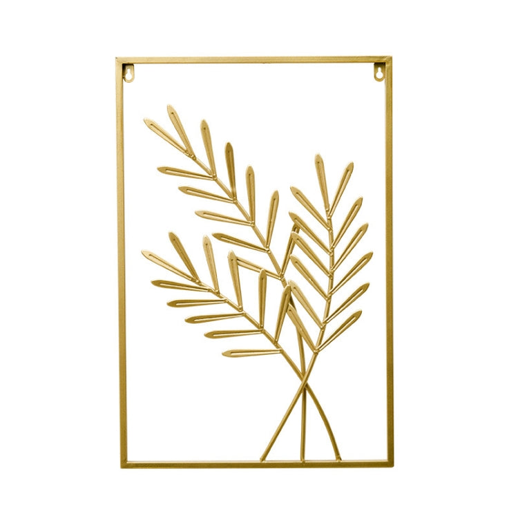 Gold metal leaf wall hanging in rectangular frame with branching leaf pattern