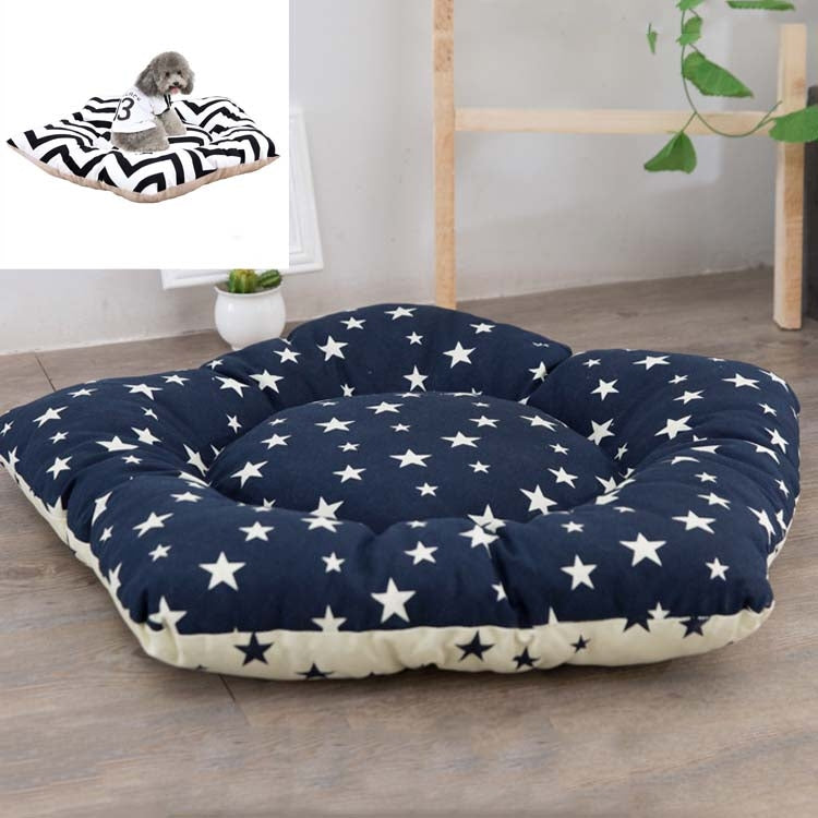 Dog sleeping mat bed with navy star pattern cushion and light cream underside edge