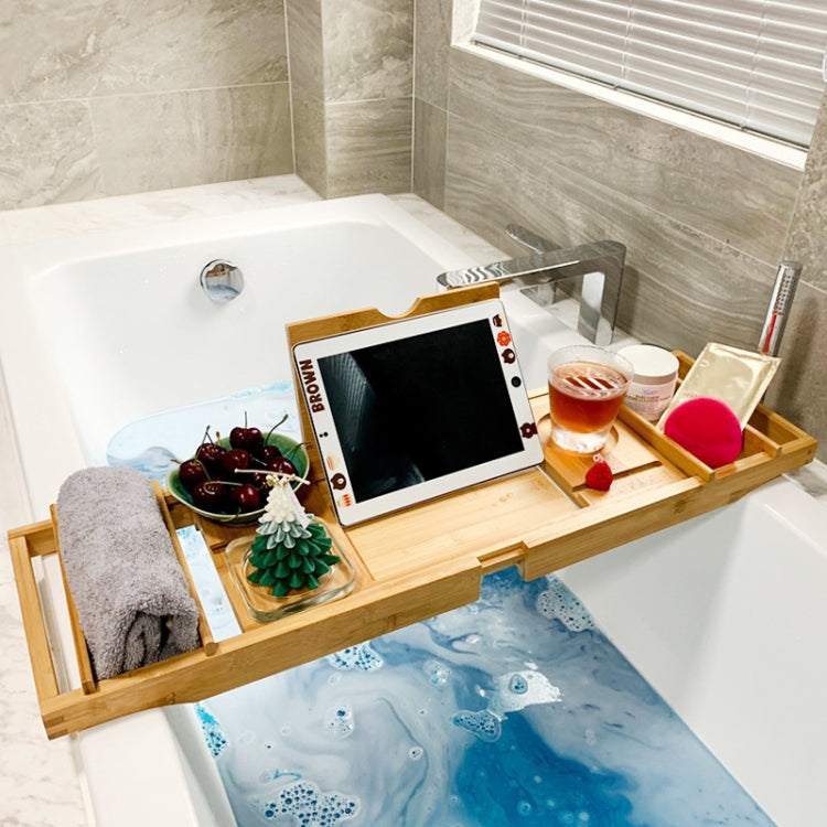 Bamboo bathtub shelf caddy with tablet, cups, side rails, and inner organizer compartments