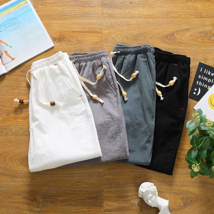 Cotton-linen five-point shorts in white, gray, dark gray, and black with drawstring