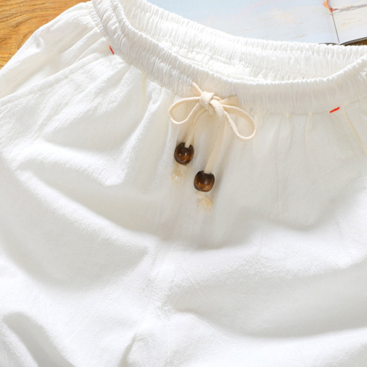 White cotton-linen five-point shorts with elastic waistband and tan drawstring