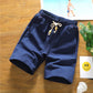 Navy blue cotton-linen five-point shorts with elastic waistband and tan drawstring