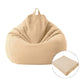 Beige fabric bean bag chair cover with carry handles and visible stitched seams