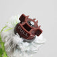 Vacuum brush roller with red pull-release latch and white plus neon green bristles
