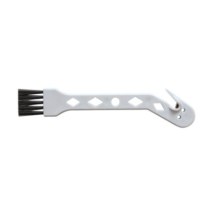 White small vacuum cleaning brush with angled bristles and mounting clip