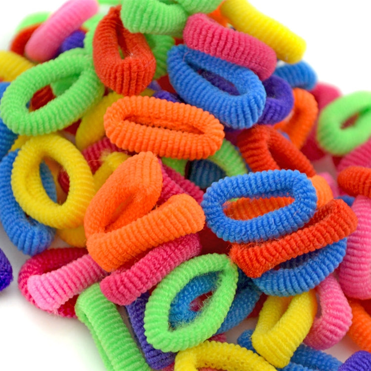 Assorted colorful rubber hair bands, close-up of multicolor loop ties