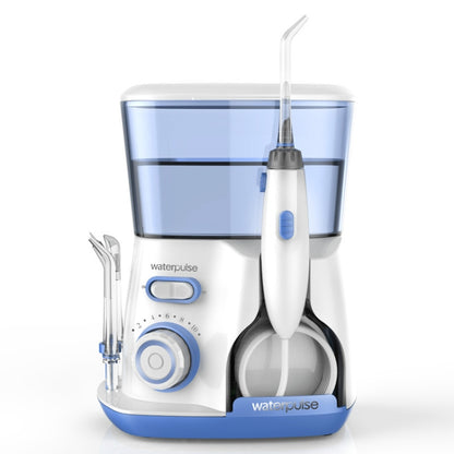 Water flosser oral irrigator with blue-tinted reservoir, handheld nozzle and water tips