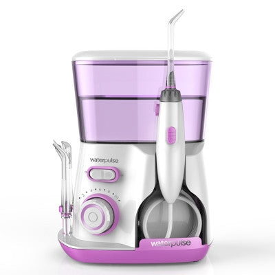 Water flosser oral irrigator with purple reservoir, handheld nozzle and water tips