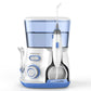 Water flosser oral irrigator with blue-tinted reservoir, handheld nozzle and water tips