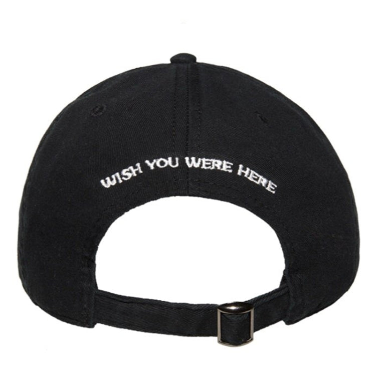 Black dad hat back with arched 'WISH YOU WERE HERE' embroidery and adjustable strap