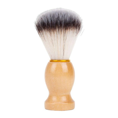 Wood shaving brush with pointed bristle head and honey-colored wooden handle