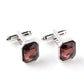 Silver-tone French cufflinks with rose-red octagon zircon stones, hinged bar backs.