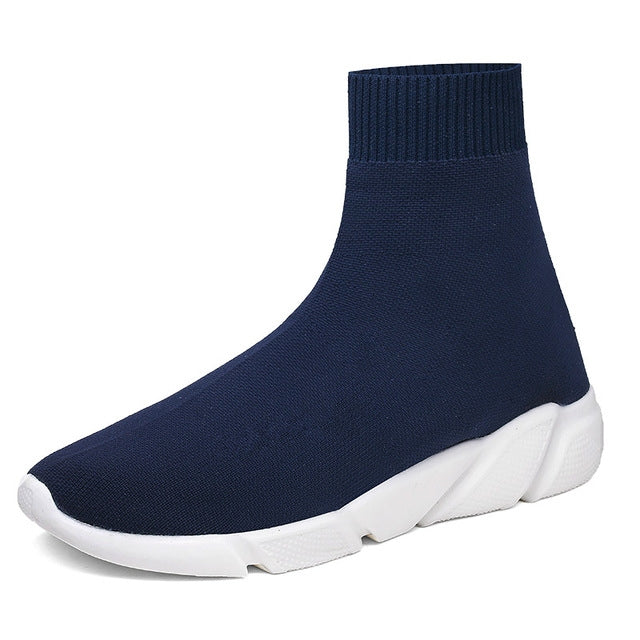 Navy breathable knit sock shoe with white rubber midsole and textured sidewall