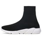Black knit sock sneaker boot with white chunky sole and ribbed ankle cuff