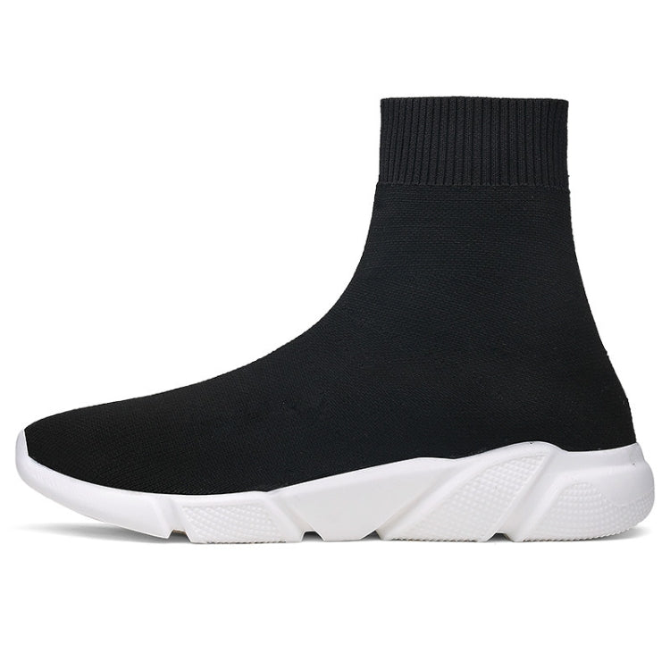 Black knit sock sneaker boot with white chunky sole and ribbed ankle cuff