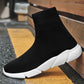 Black knit sock sneaker with white chunky sole and ribbed ankle cuff
