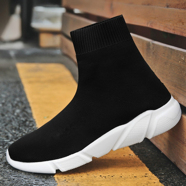 Black knit sock sneaker with white chunky sole and ribbed ankle cuff