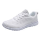Women's white mesh lace-up running sneakers with white cushioned sole
